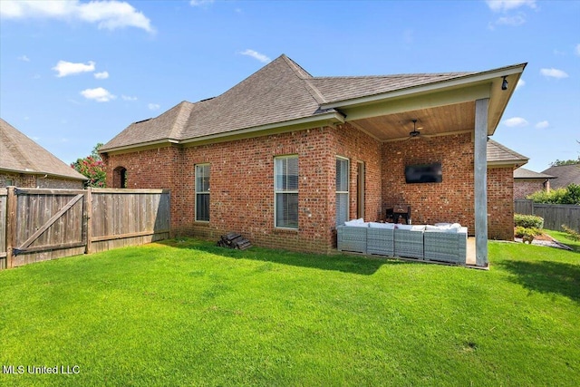 102 Hampton Chase, Madison, MS 39110 - rear view of house with ceiling fan, an outdoor living space, brick siding, a fenced backyard, and roof with shingles