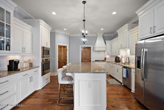 102 Hampton Chase, Madison, MS 39110 - kitchen with stainless steel appliances, decorative backsplash, white cabinets, glass insert cabinets, and recessed lighting