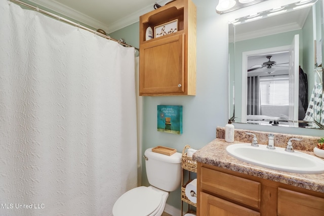 bathroom with ceiling fan, toilet, vanity, and ornamental molding