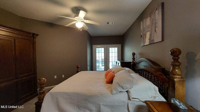 2252 Beach Dr Unit 701, Gulfport, MS 39507 - bedroom with french doors and ceiling fan