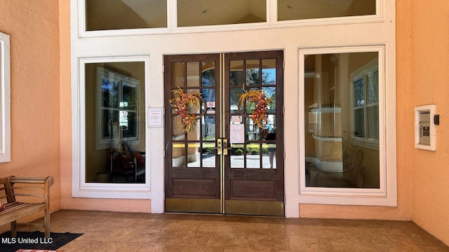 2252 Beach Dr Unit 701, Gulfport, MS 39507 - doorway to property with french doors and stucco siding