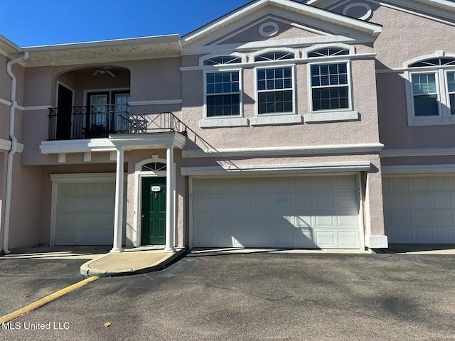 2252 Beach Dr Unit 701, Gulfport, MS 39507 - multi unit property featuring a balcony, a garage, and stucco siding