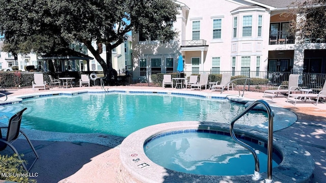 2252 Beach Dr Unit 701, Gulfport, MS 39507 - view of pool with a patio area and a pool with connected hot tub