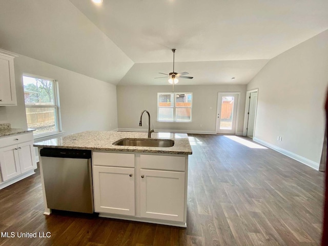 kitchen featuring sink, white cabinetry, light stone counters, dishwasher, and a kitchen island with sink