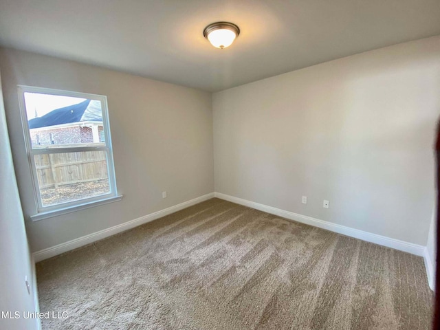 empty room with carpet floors