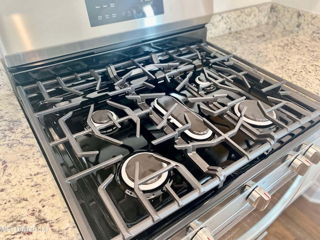 details featuring stainless steel gas range