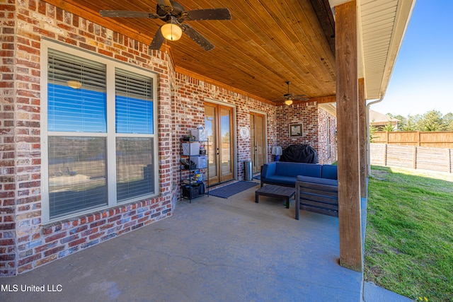 view of patio / terrace featuring an outdoor hangout area, fence, and a ceiling fan