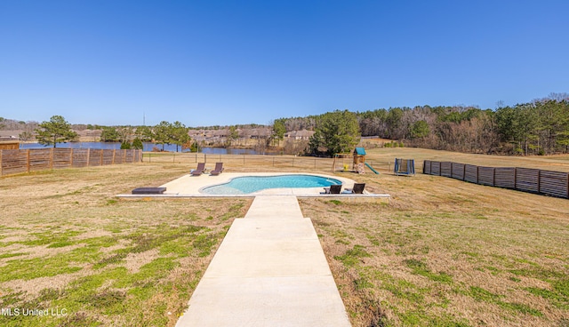 view of pool featuring a fenced backyard, a fenced in pool, a playground, and a yard