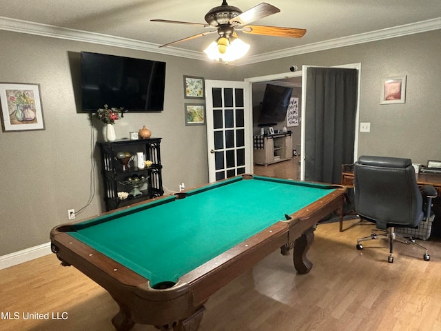 rec room featuring crown molding, baseboards, wood finished floors, billiards, and a ceiling fan