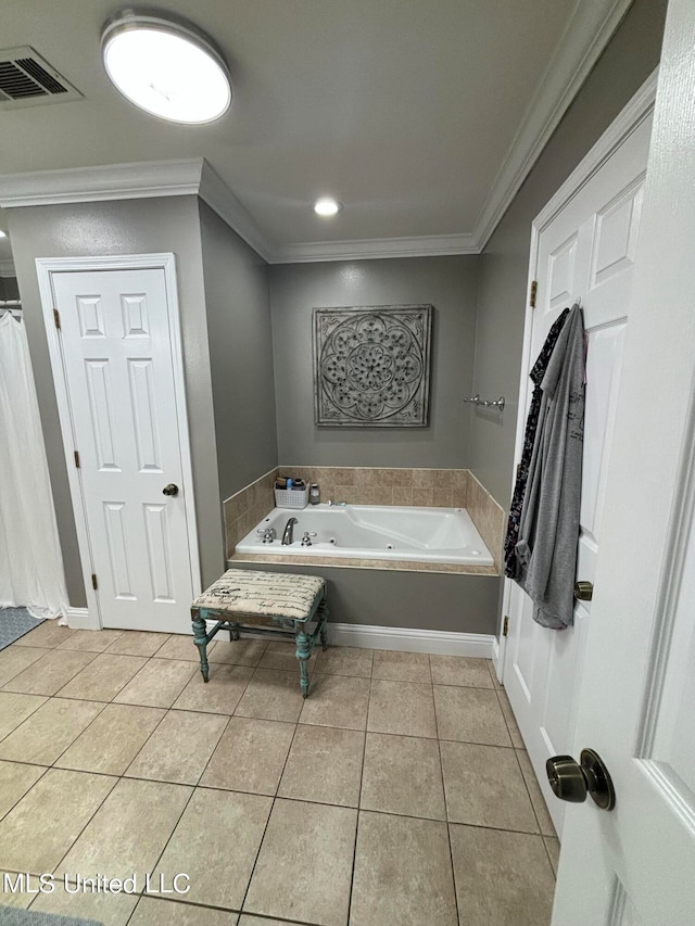 full bath with tile patterned flooring, crown molding, a jetted tub, and visible vents