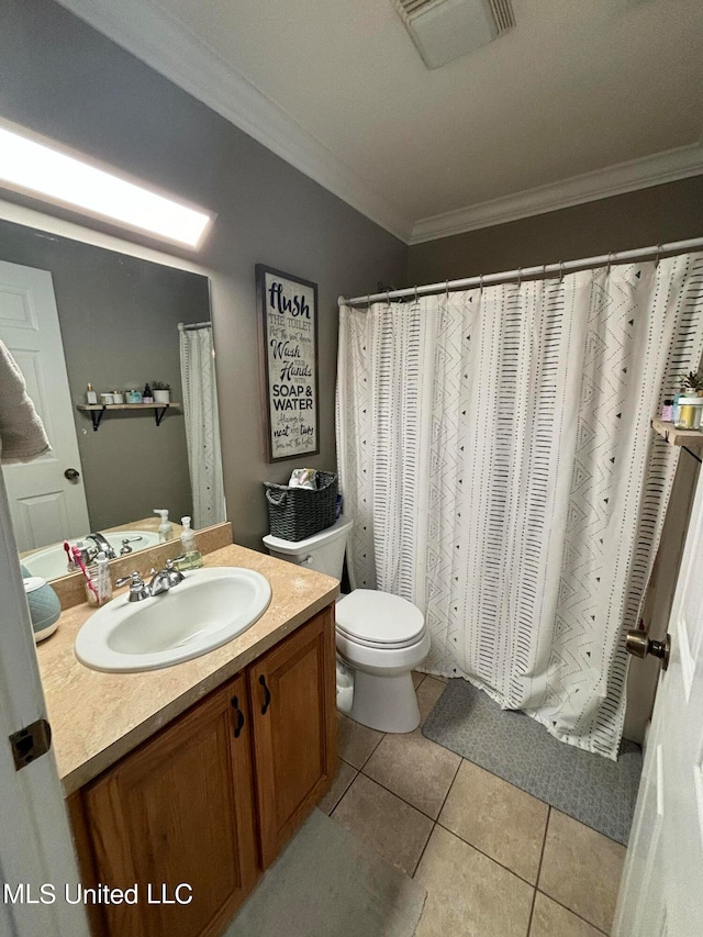 bathroom featuring visible vents, toilet, ornamental molding, tile patterned flooring, and vanity