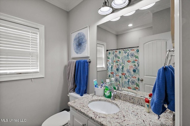 full bath featuring toilet, a shower with curtain, ornamental molding, and vanity