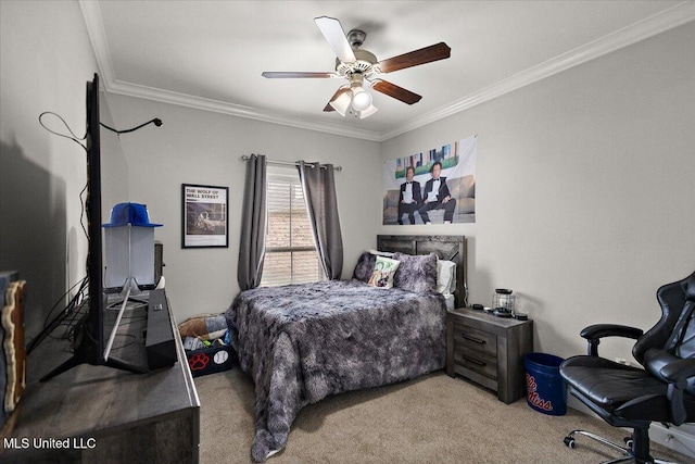 bedroom with carpet floors, ceiling fan, and crown molding