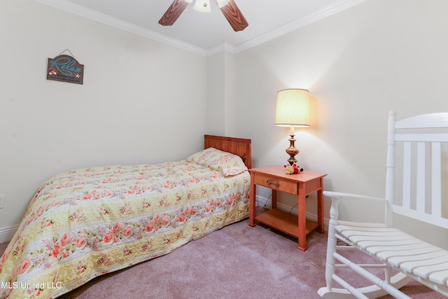 bedroom with crown molding, a ceiling fan, and light colored carpet