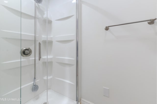 bathroom with a stall shower