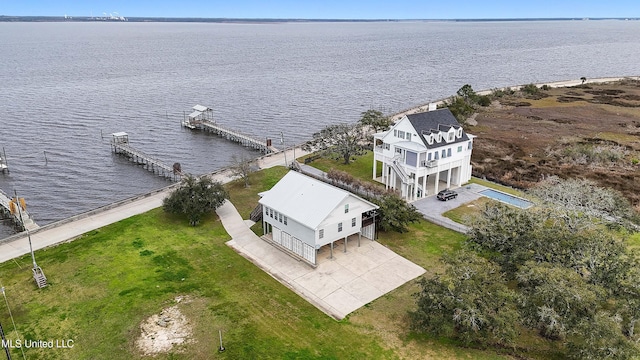 drone / aerial view with a water view