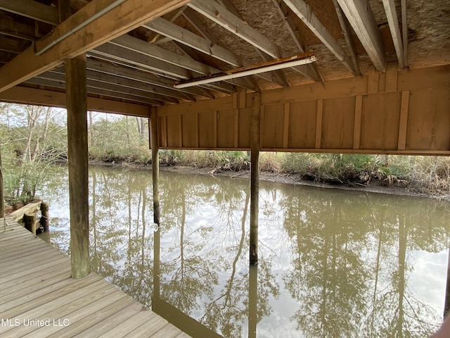 dock area featuring a water view