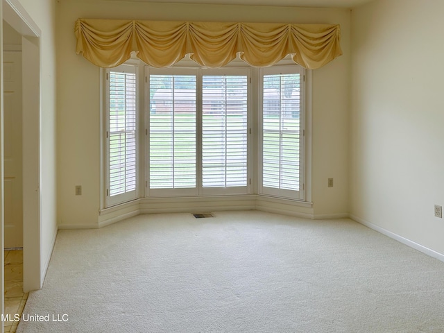 324 Bob White Dr, Canton, MS 39046 - carpeted empty room featuring baseboards