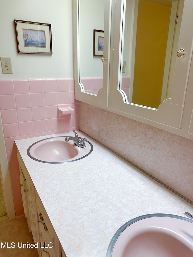 324 Bob White Dr, Canton, MS 39046 - bathroom with vanity and tile walls