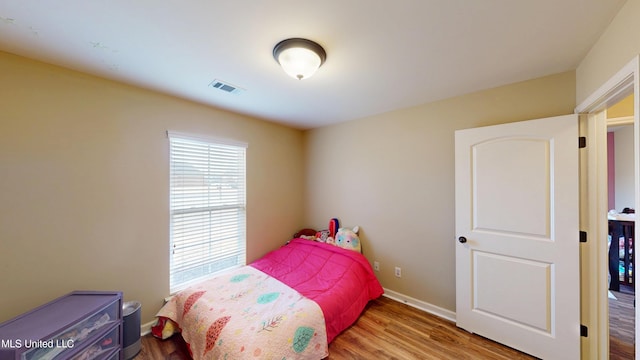 bedroom featuring light hardwood / wood-style flooring