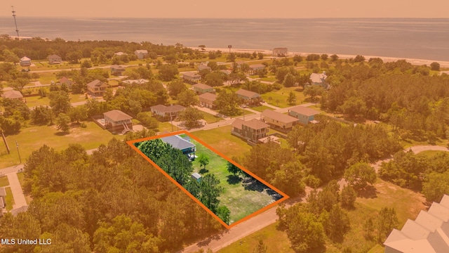 209 White Harbor Rd, Long Beach, MS 39560 - aerial view at dusk with a water view and a residential view