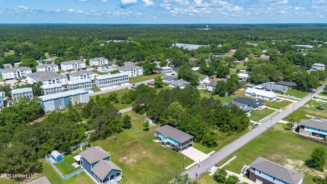 209 White Harbor Rd, Long Beach, MS 39560 - birds eye view of property featuring a view of trees