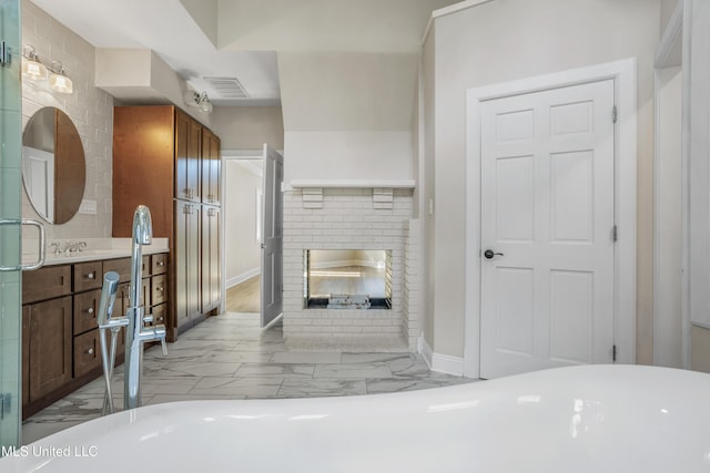 bathroom featuring a bathtub and vanity