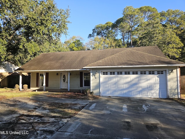 single story home featuring a garage