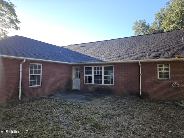 back of house featuring a patio