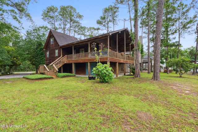 112 Dogwood Ln, Pass Christian, MS 39571 - rear view of property featuring a yard, stairs, and a deck