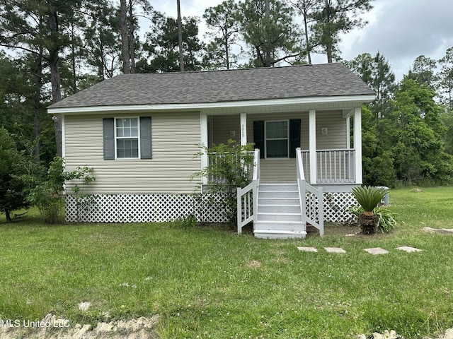 7060 Jefferson St, Bay Saint Louis, MS 39520 - bungalow-style home with a porch, a front lawn, stairway, and roof with shingles
