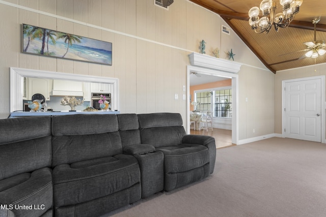 855 Dove Blvd, Bay Saint Louis, MS 39520 - carpeted living room featuring a chandelier, wooden ceiling, high vaulted ceiling, wooden walls, and ceiling fan