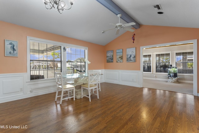 855 Dove Blvd, Bay Saint Louis, MS 39520 - dining area featuring a wainscoted wall, ceiling fan, a chandelier, wood finished floors, and a decorative wall