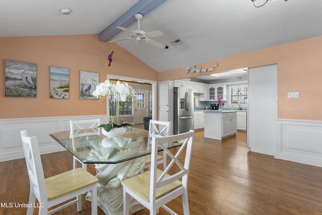 855 Dove Blvd, Bay Saint Louis, MS 39520 - dining room featuring wainscoting, wood finished floors, a ceiling fan, and a decorative wall