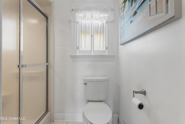 855 Dove Blvd, Bay Saint Louis, MS 39520 - bathroom with baseboards and a stall shower