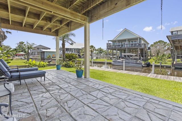 855 Dove Blvd, Bay Saint Louis, MS 39520 - view of patio / terrace with a water view