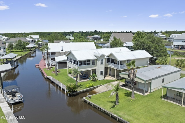 855 Dove Blvd, Bay Saint Louis, MS 39520 - aerial view of residential area with a large body of water