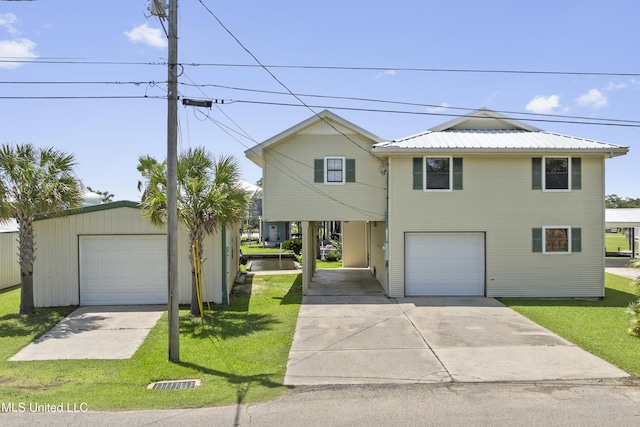 855 Dove Blvd, Bay Saint Louis, MS 39520 - view of front of house with a front lawn and driveway