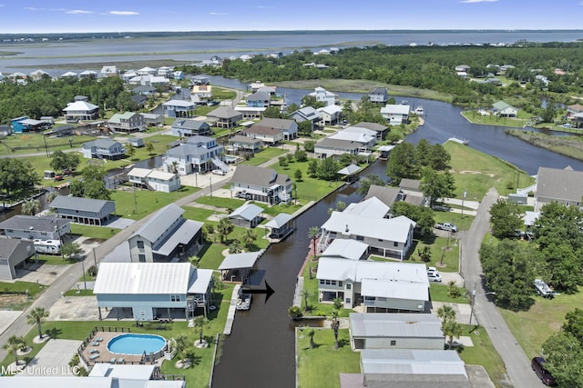 855 Dove Blvd, Bay Saint Louis, MS 39520 - aerial view of property and surrounding area featuring a nearby body of water and nearby suburban area