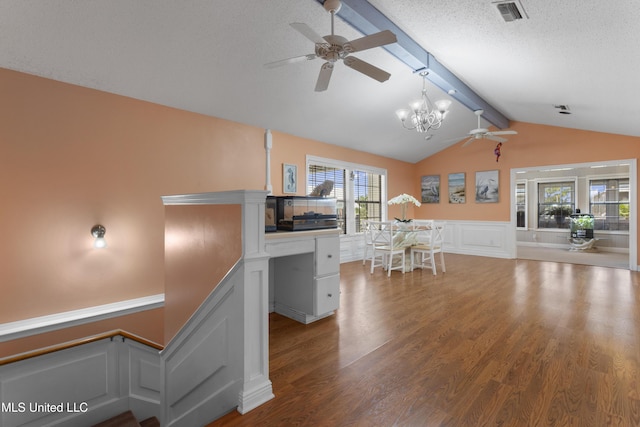 855 Dove Blvd, Bay Saint Louis, MS 39520 - kitchen with ceiling fan, wood finished floors, wainscoting, a chandelier, and a decorative wall