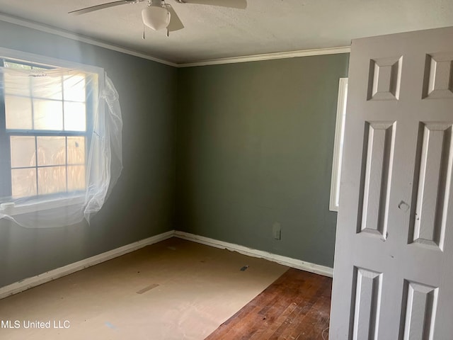 unfurnished room featuring ornamental molding, hardwood / wood-style floors, and ceiling fan