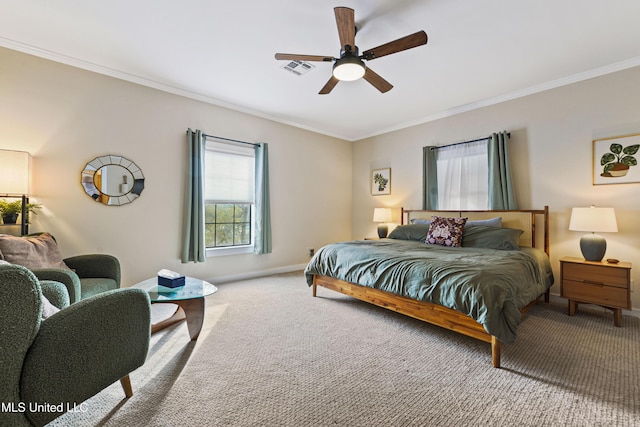 bedroom with carpet, ceiling fan, and ornamental molding