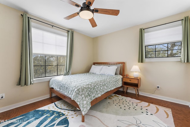 bedroom featuring hardwood / wood-style floors and ceiling fan