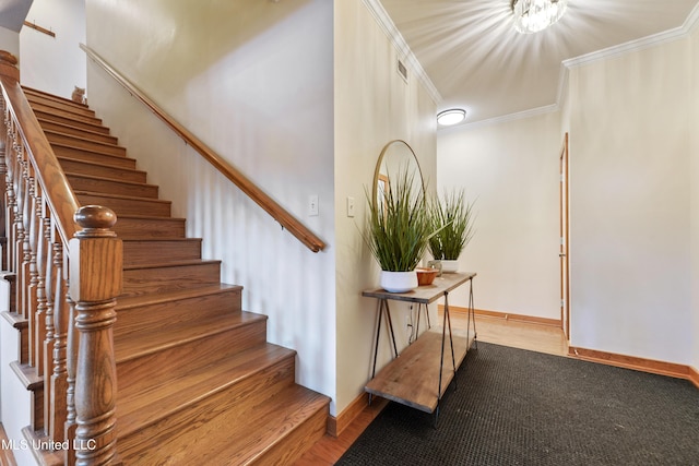 staircase with ornamental molding