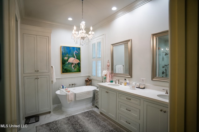 bathroom featuring a washtub, vanity, ornamental molding, and a notable chandelier