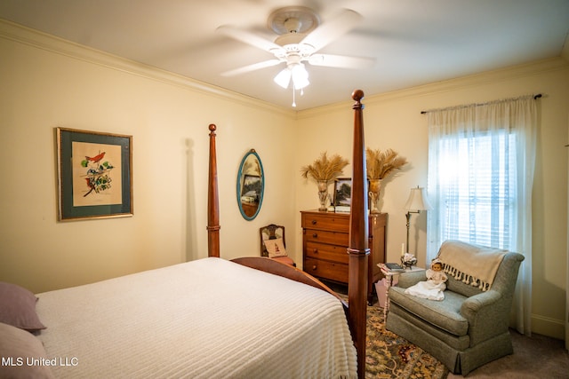 carpeted bedroom featuring ceiling fan and crown molding