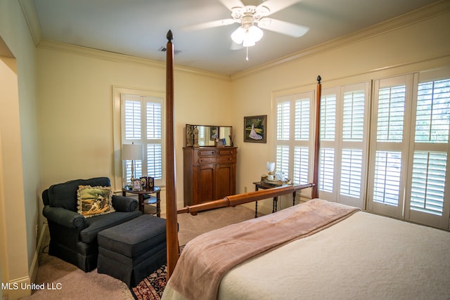 bedroom with multiple windows, ceiling fan, and carpet