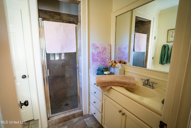 bathroom with vanity and an enclosed shower