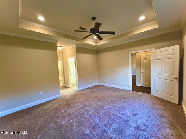 unfurnished bedroom with a raised ceiling, ceiling fan, and crown molding