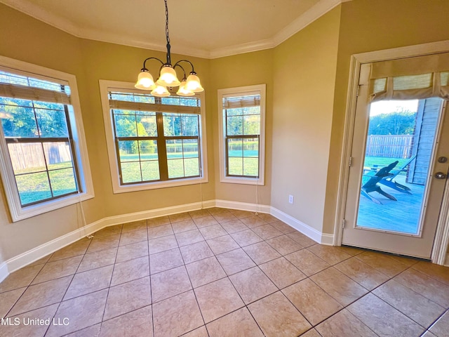 unfurnished dining area featuring light tile patterned floors, a notable chandelier, crown molding, and a healthy amount of sunlight